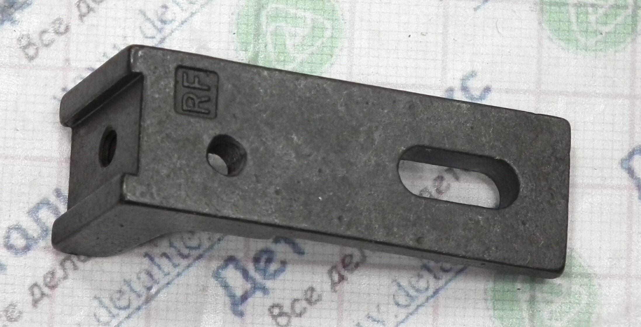 11T-04/09 кронштейн ниточного питателя